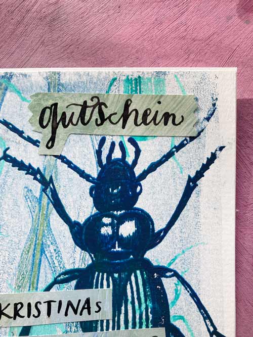 Detail vom Gutschein. Mit Käfer im Siebdruck und der kalligrafischen Handschrift von Tabea